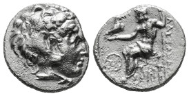 KINGS OF MACEDON. Alexander III 'the Great' (336-323 BC).Drachm.
Obv: Head of Herakles right, wearing lion skin.
Rev: AΛΕΞΑΝΔΡΟY.
Zeus seated left on ...