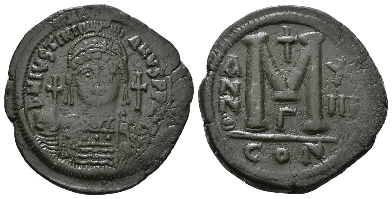 JUSTINIAN I (527-565). Follis.
Obv: D N IVSTINIANVS P P AVG.
Helmeted and cuiras...