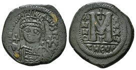 JUSTINIAN I (527-565). Follis.
Obv: D N IVSTINIANVS P P AVG.
Helmeted and cuirassed bust facing, holding globus cruciger and shield decorated with hor...