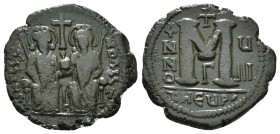 JUSTIN II, with SOPHIA (565-578). Follis. 
Obv: D N IVSTINVS PP AVG.
Justin and Sophia seated facing on double throne, holding globus cruciger and cru...