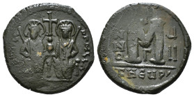 JUSTIN II, with SOPHIA (565-578). Follis. 
Obv: D N IVSTINVS PP AVG.
Justin and Sophia seated facing on double throne, holding globus cruciger and cru...