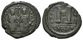 JUSTIN II, with SOPHIA (565-578). Follis. 
Obv: D N IVSTINVS PP AVG.
Justin and Sophia seated facing on double throne, holding globus cruciger and cru...