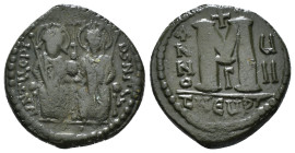 JUSTIN II, with SOPHIA (565-578). Follis. 
Obv: D N IVSTINVS PP AVG.
Justin and Sophia seated facing on double throne, holding globus cruciger and cru...