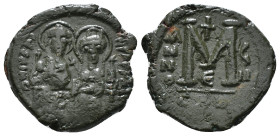 JUSTIN II, with SOPHIA (565-578). Follis. 
Obv: D N IVSTINVS PP AVG.
Justin and Sophia seated facing on double throne, holding globus cruciger and cru...