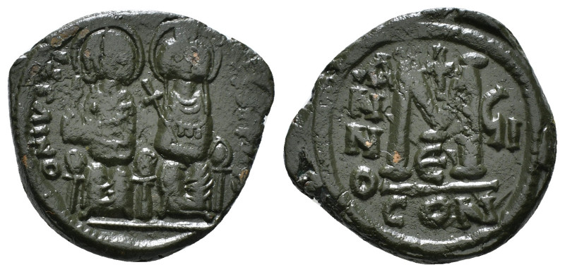 JUSTIN II, with SOPHIA (565-578). Follis. 
Obv: D N IVSTINVS PP AVG.
Justin and ...