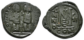 JUSTIN II, with SOPHIA (565-578). Follis. 
Obv: D N IVSTINVS PP AVG.
Justin and Sophia seated facing on double throne, holding globus cruciger and cru...