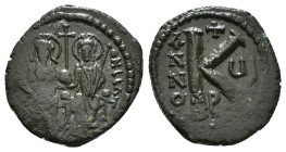 JUSTIN II, with SOPHIA (565-578). Follis. 
Obv: D N IVSTINVS PP AVG.
Justin and Sophia seated facing on double throne, holding globus cruciger and cru...