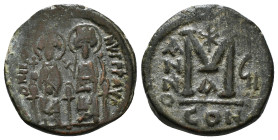 JUSTIN II, with SOPHIA (565-578). Follis. 
Obv: D N IVSTINVS PP AVG.
Justin and Sophia seated facing on double throne, holding globus cruciger and cru...