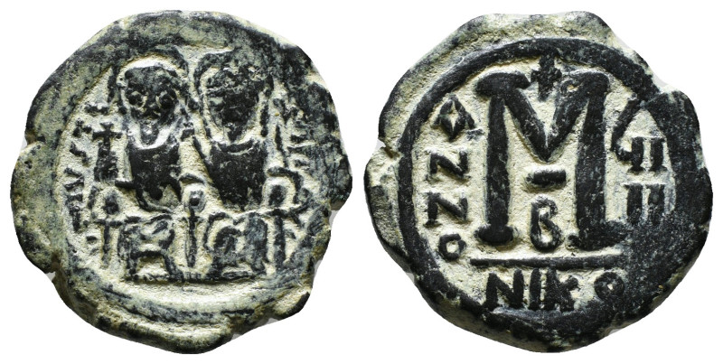 JUSTIN II, with SOPHIA (565-578). Follis. 
Obv: D N IVSTINVS PP AVG.
Justin and ...