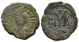 MAURICE TIBERIUS (582-602). Follis. Constantinople.
Obv: D. N. TIBER AVRC PP AVC.
Crowned facing bust, wearing cuirass, holding globe cruciger and shi...