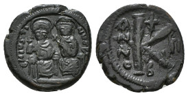 JUSTIN II, with SOPHIA (565-578). Follis. 
Obv: D N IVSTINVS PP AVG.
Justin and Sophia seated facing on double throne, holding globus cruciger and cru...