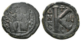 Justin II and Sophia AD 565-578. Dated RY 5=AD 569/0.. Theoupolis (Antioch) Half follis Æ . Justin, on left, and Sophia, on right, seated facing on a ...