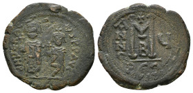 Heraclius with Heraclius Constantine AD 610-641. Constantinople Follis Æ (35mm., 12.2 g). Heraclius, on left, and Heraclius Constantine, on right, sta...