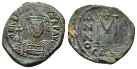 Heraclius, AD 610-641. AE, Follis. Constantinople. Dated RY 2 (611-12). Obv: dN hRACLIVS-PERP AVG. Plumed-helmeted and cuirassed bust facing, bearded,...