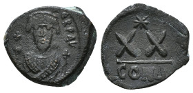 PHOCAS (602-610). Half Follis. Constantinople.
Obv: δ N FOCA PЄRP AVG.
Crowned bust facing, wearing consular robes, holding mappa and cross; star in...