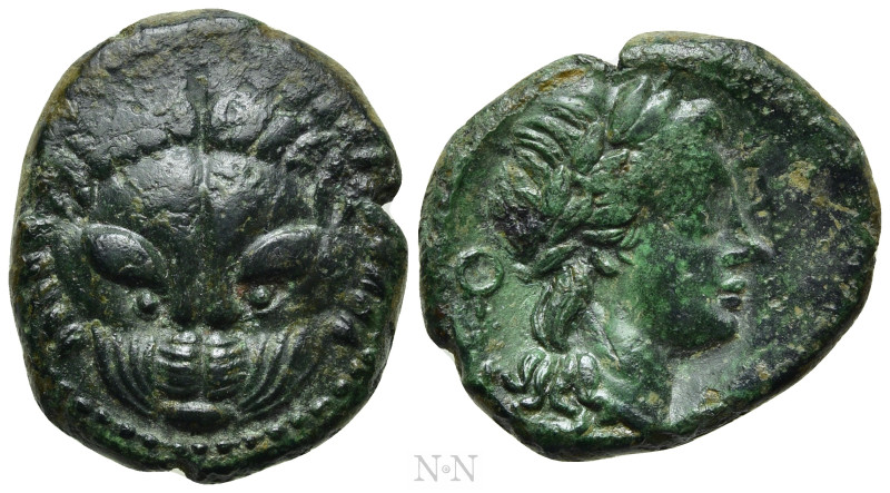 BRUTTIUM. Rhegion. Ae (Circa 351-280 BC). 

Obv: Facing head of lion.
Rev: PH...