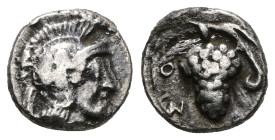 CILICIA, Soloi. Circa 350-300 BC. AR Obol. Helmeted head of Athena right / Grape bunch on vine.
Weight 0,71 gr - Diameter 7 mm.