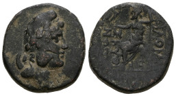 Phrygia. Philomelion 133 BC. AE. 
Laureate and draped bust of Men on crescent right, wearing phrygian cap
Rev. Zeus seated left holding eagle in right...