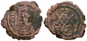 Phocas, 602-610 AD. AE, Half Follis.
Weight 5,55 gr - Diameter 24 mm.