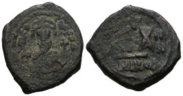 Phocas, 602-610 AD. AE, Half Follis.
Weight 6,48 gr - Diameter 24 mm.