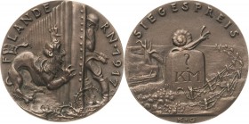 Medailleur Goetz, Karl 1875 - 1950
 Bronzegußmedaille 1917. Flandern - Siegespreis. Löwe greift eine Faltmauer an, dahinter Soldat / Im Feld Gedenkst...