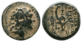 SELEUKID KINGDOM. Tryphon (Circa 142-138 BC). Ae. Reference : "Repatinated" Condition: Very Fine

 Weight: 4.43 gr. Diameter:17.2 mm.