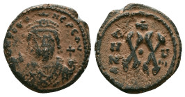 Byzantine Coins. Circa 7th – 12th Century. Reference : "Repatinated" Condition: Very Fine

 Weight: 4.28 gr. Diameter:18.9 mm.