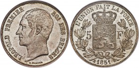 Leopold I 5 Francs 1851 MS65 NGC, KM17. "No dot above date" variety. A superb offering with satiny fields and lightly frosted, sharply struck devices....