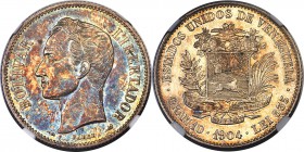 Republic 2 Bolivares 1904 AU58 NGC, KM-Y23. An eye-catching specimen with a dappling of cerulean and apricot coloration that heavily overlays the obve...