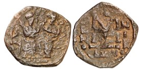 Arab-Byzantine coins, Palestine and al-Urdunn copper coins.

AE Fals/Follis of Justin II and Sophia type, Skythopolis/Baysân. Imperial couple enthro...