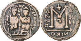 Arab-Byzantine coins, Palestine and al-Urdunn copper coins. 

AE Fals/Follis of Justin II and Sophia type, Gerasa/Jarash. Imperial couple on a high th...