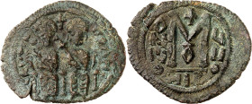 Arab-Byzantine coins, Palestine and al-Urdunn copper coins. 

AE Fals/Follis of Justin II and Sophia type, Skythopolis/Baysân. The imperial couple ent...