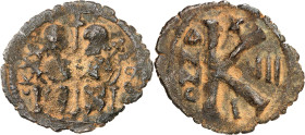 Arab-Byzantine coins, Palestine and al-Urdunn copper coins. 

AE 1/2 Fals/Follis of Justin II and Sophia type, Skythopolis/Baysân. Imperial couple ent...