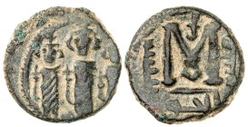 Arab-Byzantine coins, Palestine and al-Urdunn copper coins.

AE Fals/Follis Heraclius type, Skythopolis/Baysân. Three emperors standing / M with off...