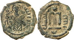 Arab-Byzantine coins, Temp. of ‘Abd al-Malik ibn Marwân, 65-70 H./685-705 AD.

AE Fals of standing caliph type, Iliyâ. The caliph with whip hanging do...