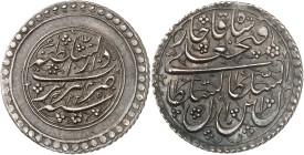 Fath’alî Shâh, 1212-1250 H./1797-1834 AD. 

Silver presentation 1/4 Rial 1225 H., Tabrîz. 2,45g. KM 685. 

Rare. Good extremely fine.