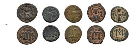 Arab-Byzantine coins. 

Lot of 95 very early AE coins mostly struck under Islamic rule following Byzantine coin types, generally of Heraclius and Cons...