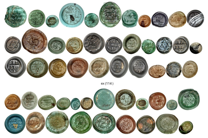 A collection of 114 Glass Weights, Vessel Stamps and Seals from the Umayyad, Abb...