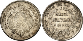 Republic of Bolivia.

50 Centavos (1/2 Boliviano) 1879/7 PTS FE, Potosi. Crossed flags and weapons behind condor-topped oval arms, stars below / Denom...