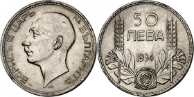 Boris III, 1918-1943.

50 Leva 1934 BP, Budapest. Head left / Denomination, date below, flowers at bottom, flanked by ears of wheat. 9,99g. KM 44.
...