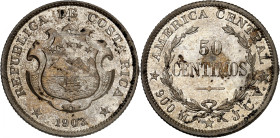 Republic of Costa Rica.

50 Centavos 1903 JCV, San Jose or Philadelphia. Arms, date below / Denomination within wreath. 10,0g. KM 143.

NGC MS63 (...