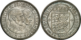 Christian X, 1912-1947.

2 Kroner 1923, Copenhagen. Jugate heads of Christian X and Queen Alexandrine right / Crowned arms, date and denomination be...