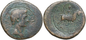 Augustus (27 BC - 14 AD). AE 24 mm, Amphipolis mint (Macedon). Obv. Bare head right. Rev. Artemis Tauropolos on bull right, holding veil above head wi...