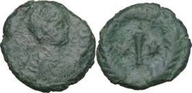 Justinian I (527-565). AE Decanummium, Rome mint. Obv. Diademed, draped and cuirassed bust right. Rev. Large I between two stars; all within wreath. D...