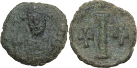 Tiberius II Constantine (578-582). AE Decanummium, Ravenna mint. Obv. Helmeted and cuirassed bust facing, holding globus cruciger and shield. Rev. Lar...