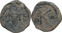 Maurice Tiberius (582-602). AE Half follis, Cyzicus mint, dated RY 8 (589-590). Obv. Crowned and cuirassed bust facing, holding globus cruciger and sh...