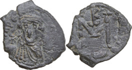 Constans II (641-668). AE Follis, Syracuse mint. Obv. Crowned and draped bust facing, holding globus cruciger. Rev. Large M (mark of value); above, mo...