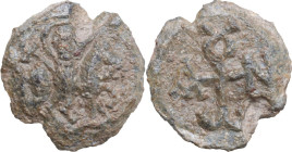PB Seal, 7-12th century. Obv. Saint on horseback right (St. George or St. Demetrius). Rev. Cruciform monogram. PB. 6.91 g. 20 mm. VF.