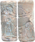 NEO ASSYRIAN CYLINDER SEAL Neo Assyrian period, c. late 2nd - early 1st millennium BC. Large green steatite seal with interesting engraved scene. Arch...