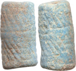 GEOMETRIC FAIENCE SEAL Ancient Near East, c. 2nd millennium BC. Faience seal with complex geometric decoration of oblique and horizontal lines. Height...